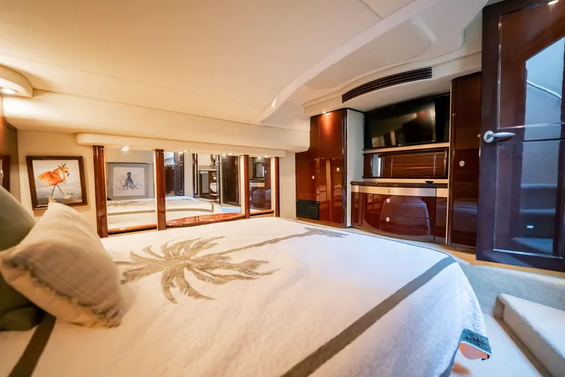 Slide: The Image of Luxurious 2007 Sea Ray 580 Sedan Bridge bedroom with elegant decor and modern amenities. - 34