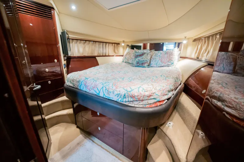 Slide: The Image of Luxurious bedroom interior of 2007 Sea Ray 580 Sedan Bridge yacht. - 37