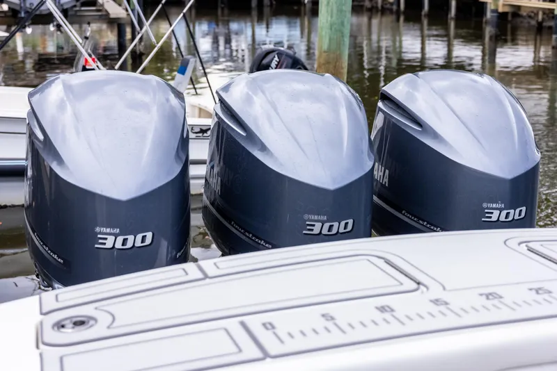 Slide: The Image of Triple Yamaha 300 outboard engines on a 2019 Regulator 34 boat. - 4