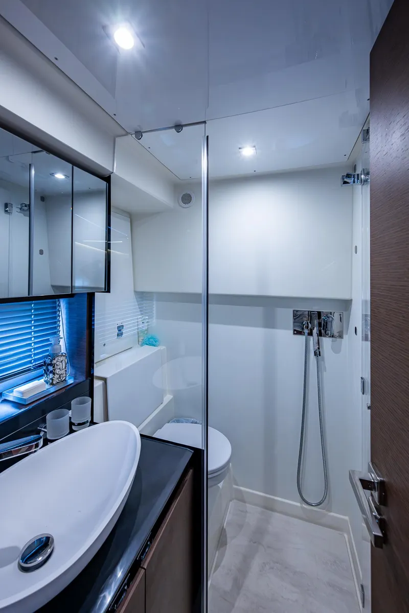 Slide: The Image of Modern bathroom in 2019 Prestige 460 yacht with sleek fixtures and glass shower. - 47