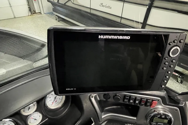 Slide: The Image of Humminbird Helix 10 fish finder on 2018 Lund 1875 Impact Sport boat dashboard. - 13