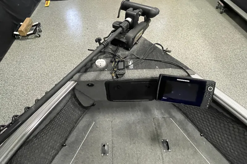 Slide: The Image of 2018 Lund 1875 Impact Sport boat interior with fish finder and trolling motor. - 15