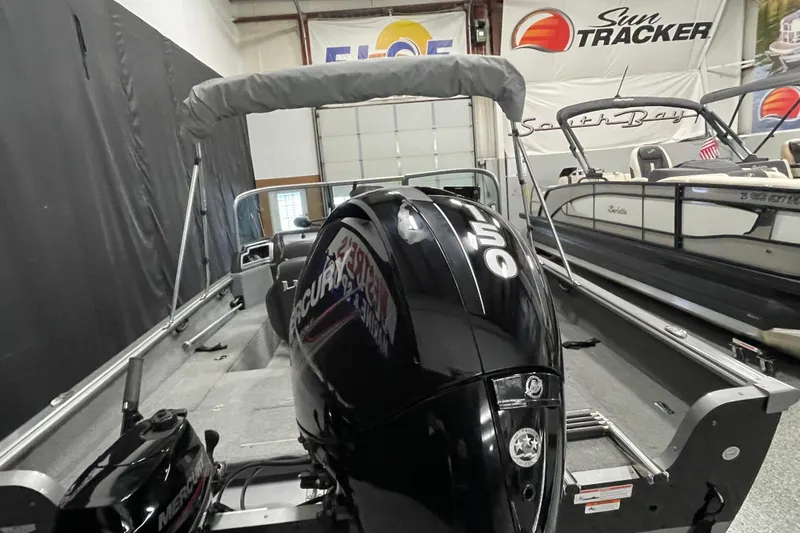 Slide: The Image of 2018 Lund 1875 Impact Sport boat with Mercury outboard motor in showroom. - 5