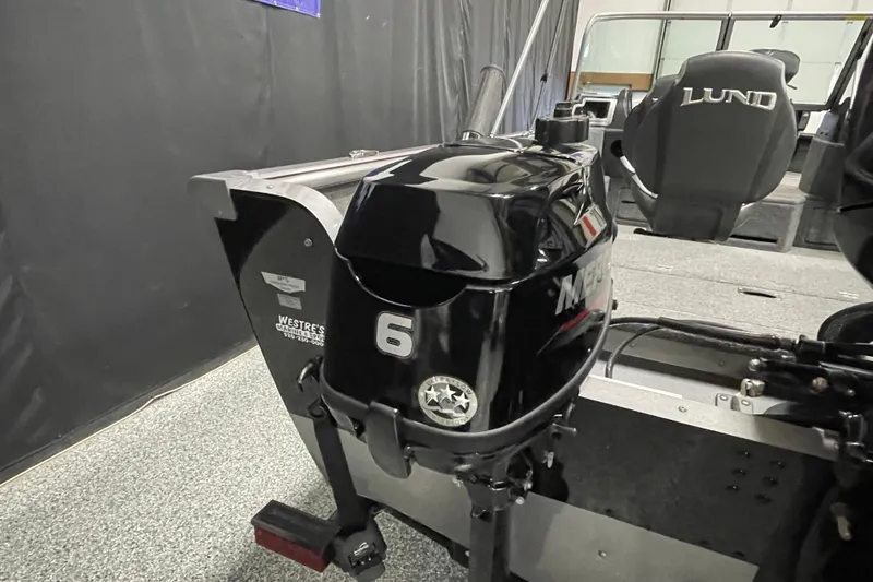 Slide: The Image of 2018 Lund 1875 Impact Sport boat with Mercury 6HP outboard motor. - 6