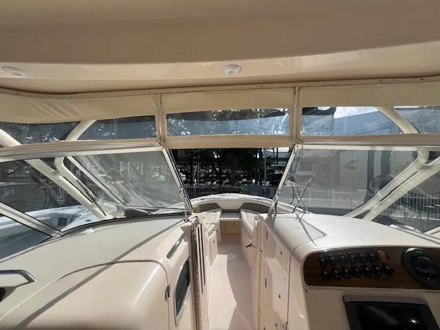Slide: The Image of 2013 Grady-White Freedom 335 boat interior with helm and seating area. - 36
