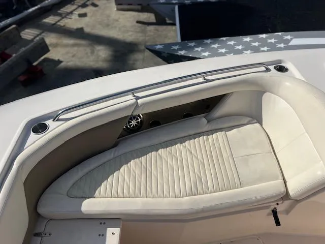 Slide: The Image of Grady-White Freedom 335 boat, 2013 model, featuring a white cushioned seating area. - 39