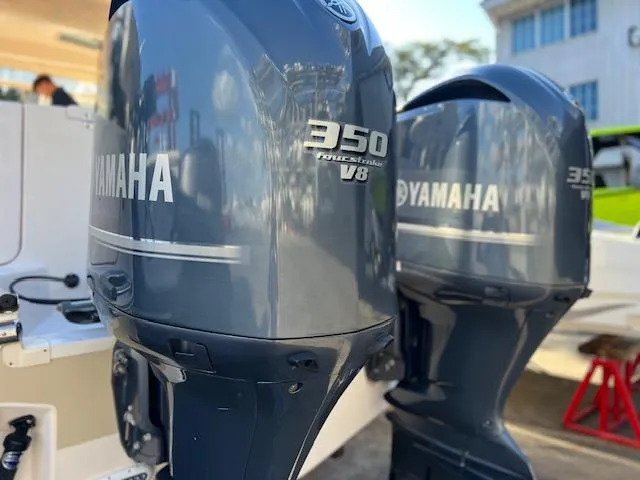 Slide: The Image of Twin Yamaha 350 V8 outboard engines on a 2013 Grady-White Freedom 335 boat. - 47