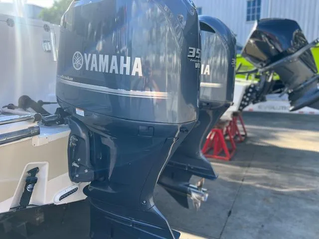 Slide: The Image of Yamaha outboard motors on a 2013 Grady-White Freedom 335 boat. - 48