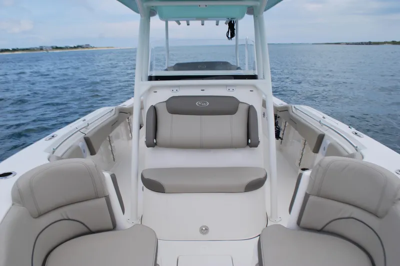 Slide: The Image of 2022 Key West 263 FS boat interior with comfortable seating on open water. - 10