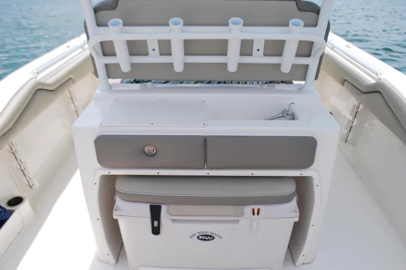 Slide: The Image of 2022 Key West 263 FS boat interior with storage and seating area. - 15