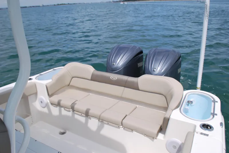 Slide: The Image of 2022 Key West 263 FS boat with twin Yamaha engines on open water. - 16