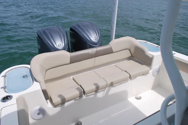 Slide: The Image of 2022 Key West 263 FS boat with dual engines and comfortable seating. - 18