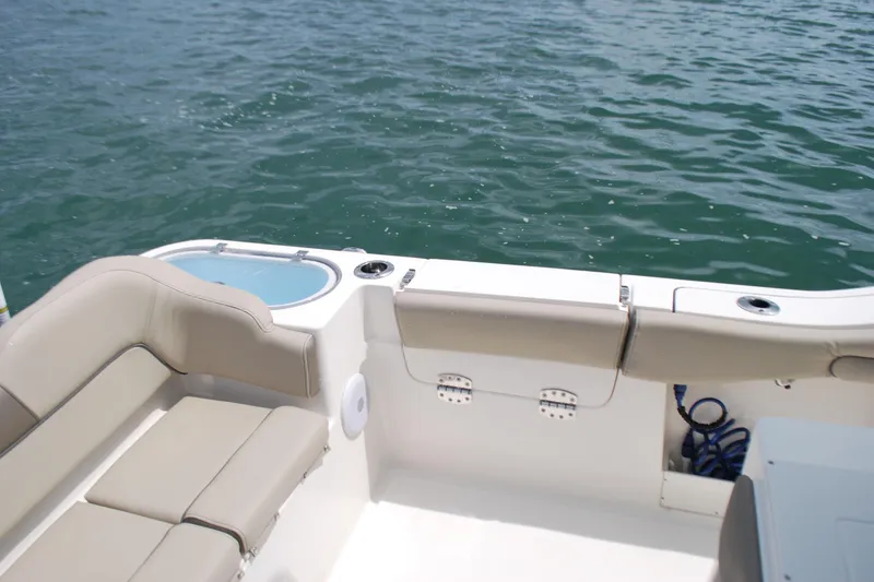 Slide: The Image of 2022 Key West 263 FS boat interior with seating and water view. - 19