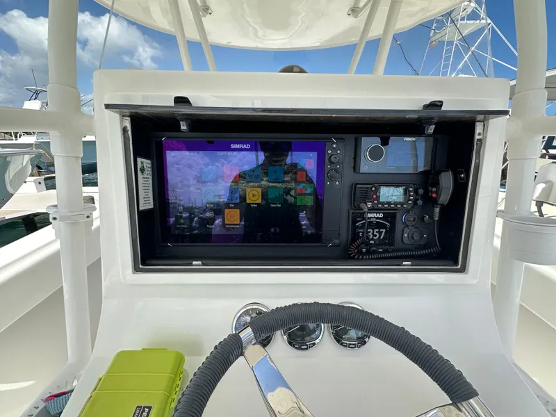 Slide: The Image of Control panel of a 2006 Island Runner 35 boat with navigation equipment. - 13