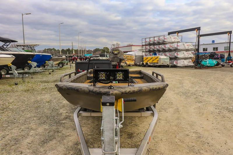 Slide: The Image of 2026 Gator Tail 17/50 MID-DECK SAVAGE SERIES boat on trailer in outdoor lot. - 7