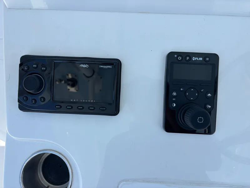 Slide: The Image of Control panel of Invincible 35 Catamaran 2024 with controls. - 19