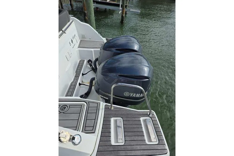 Slide: The Image of 2020 Jeanneau Leader 9.0 WA with twin Yamaha outboard engines on water. - 3