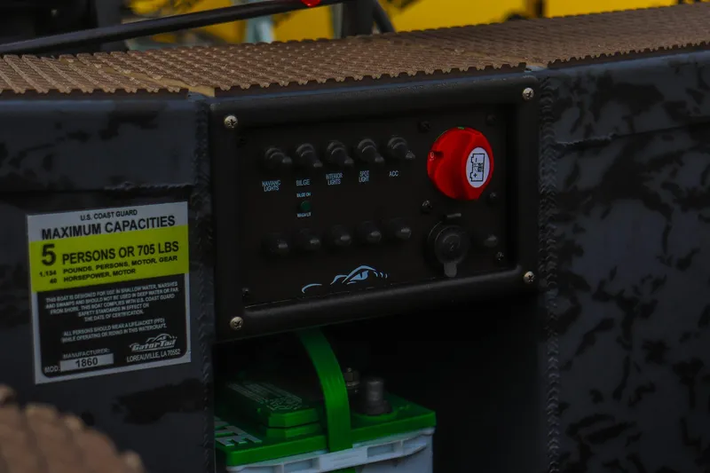 Slide: The Image of Control panel of 2026 Gator Tail 1860 Extreme series boat with capacity label. - 14