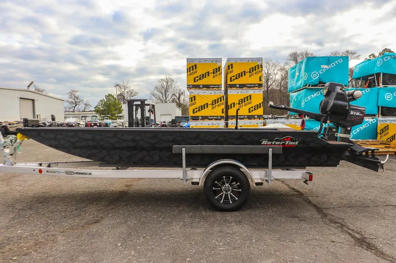 Slide: The Image of 2026 Gator Tail 1860 Extreme series boat on trailer, outdoor display. - 5