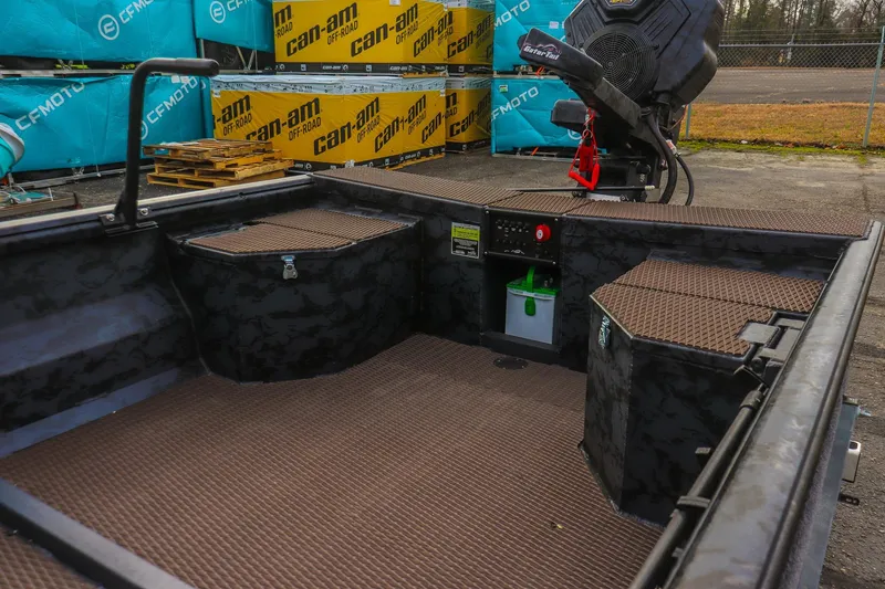 Slide: The Image of 2026 Gator Tail 1860 Extreme series boat interior with storage compartments and engine. - 8