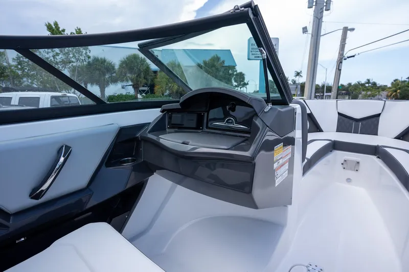 Slide: The Image of 2024 Monterey 235SS Super Sport boat interior with sleek dashboard and seating. - 10