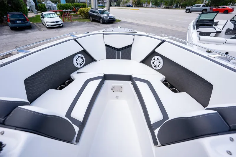 Slide: The Image of 2024 Monterey 235SS Super Sport boat interior with sleek seating and modern design. - 12
