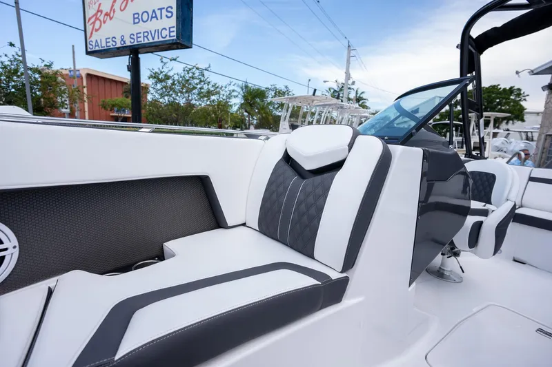 Slide: The Image of 2024 Monterey 235SS Super Sport boat interior with sleek seating and modern design. - 13