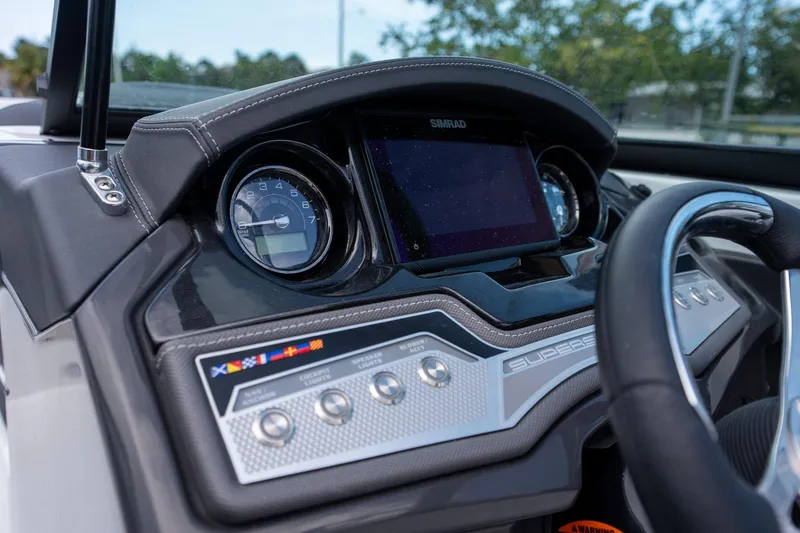 Slide: The Image of Dashboard of 2024 Monterey 235SS Super Sport boat with modern controls and display. - 7