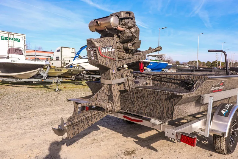 Slide: The Image of 2026 Gator Tail 1860 Extreme series boat with camo design on a trailer. - 12
