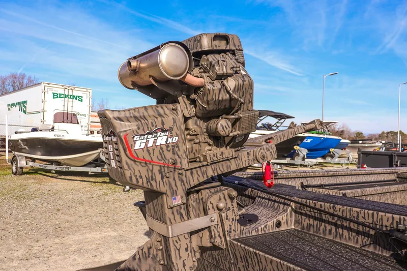 Slide: The Image of 2026 Gator Tail 1860 Extreme series boat with camo design and powerful motor. - 14