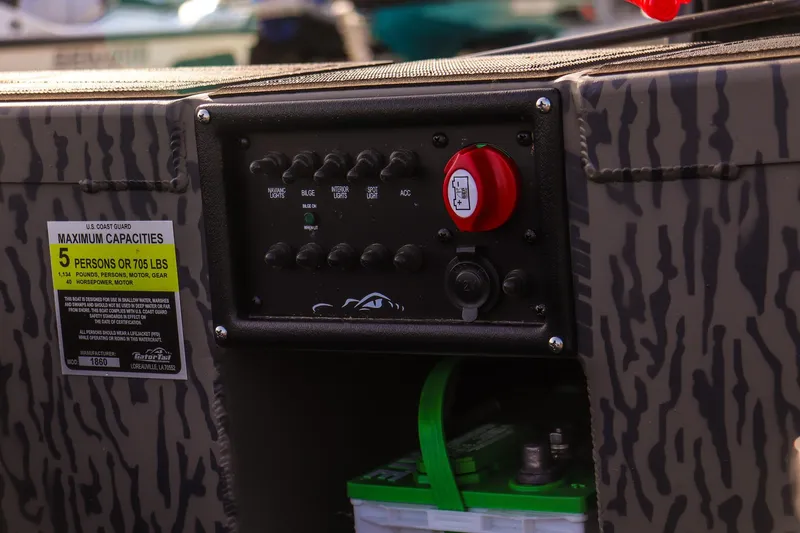 Slide: The Image of Control panel of 2026 Gator Tail 1860 Extreme series boat with capacity label. - 15