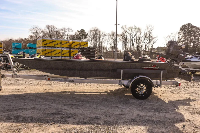 Slide: The Image of 2026 Gator Tail 1860 Extreme series boat on trailer, parked outdoors. - 5