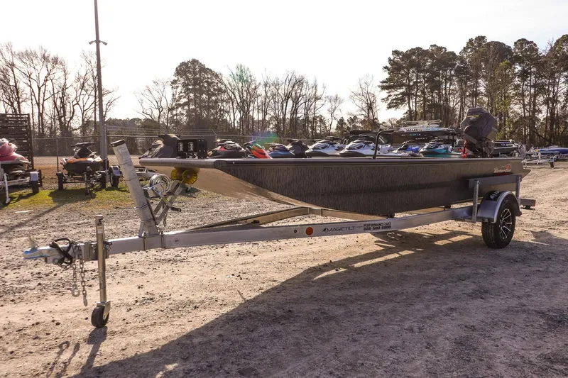 Slide: The Image of 2026 Gator Tail 1860 Extreme series boat on trailer in outdoor setting. - 6