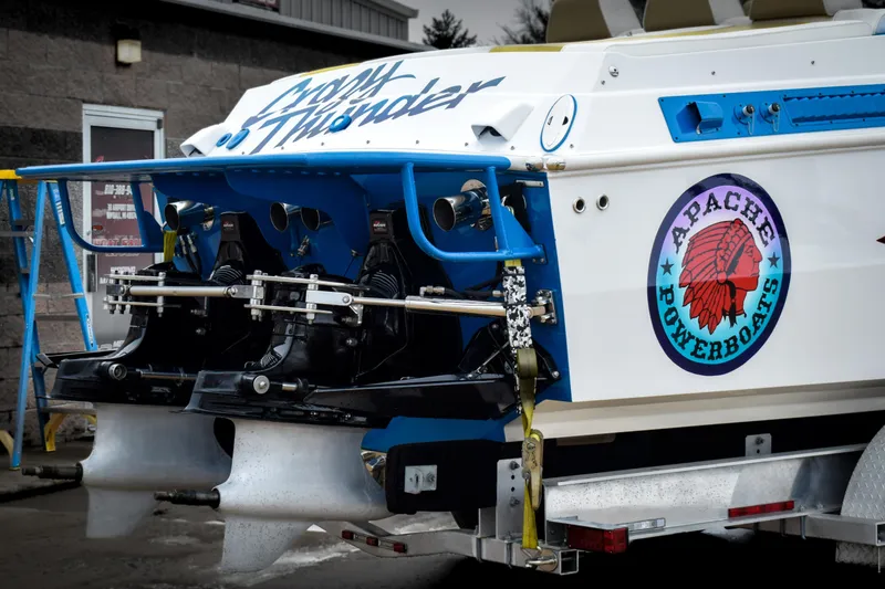 Slide: The Image of 1998 Apache 36 WARRIOR powerboat with dual engines and Apache Powerboats logo. - 3