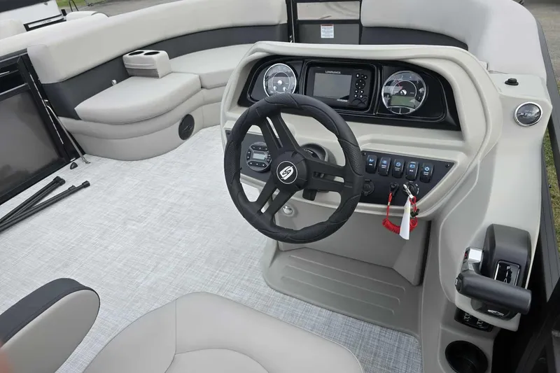 Slide: The Image of 2026 Dockside boat interior with modern steering wheel and dashboard controls. - 11