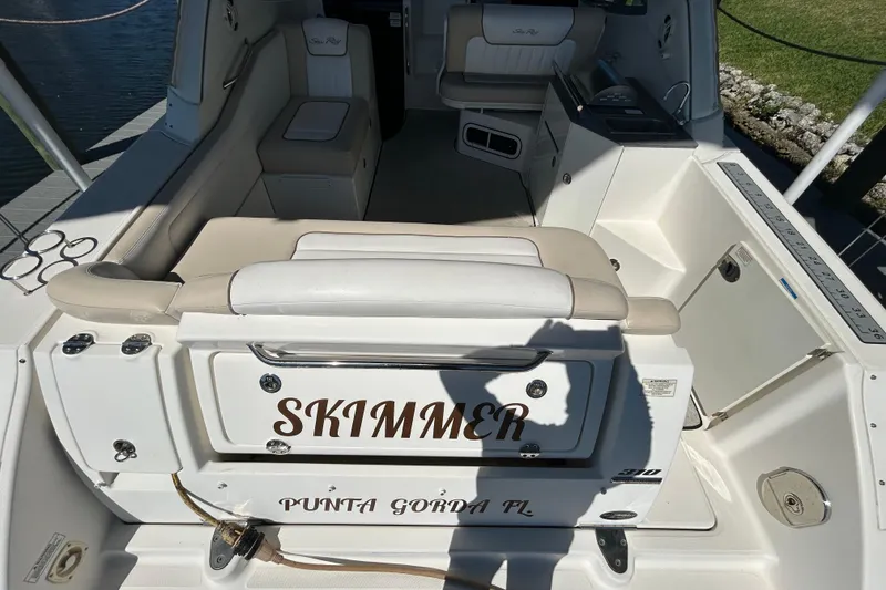 Slide: The Image of Electrical panel inside a 2012 Sea Ray Sundancer 310 boat compartment. - 104