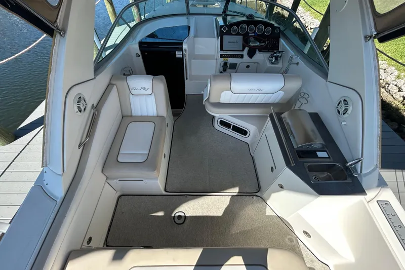 Slide: The Image of Storage compartment with cooler on a 2012 Sea Ray Sundancer 310 boat. - 107
