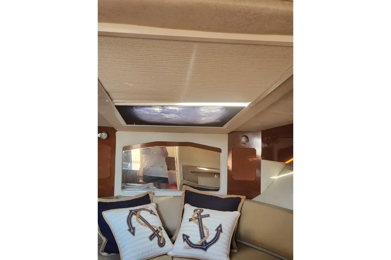 Slide: The Image of Close-up of a 2012 Sea Ray 310 Sundancer boat propeller in water. - 11