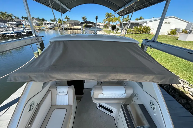 Slide: The Image of Open storage compartment on a 2012 Sea Ray Sundancer 310 boat. - 110