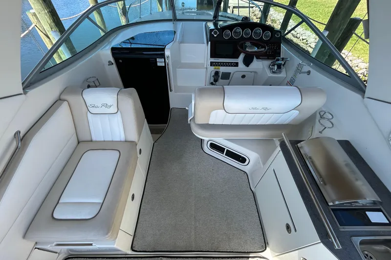 Slide: The Image of Storage compartment inside 2012 Sea Ray Sundancer 310 boat, featuring clean interior space. - 111