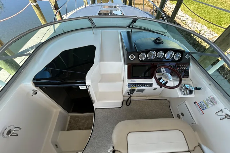 Slide: The Image of Anchor and rope storage on 2012 Sea Ray Sundancer 310 boat deck. - 116