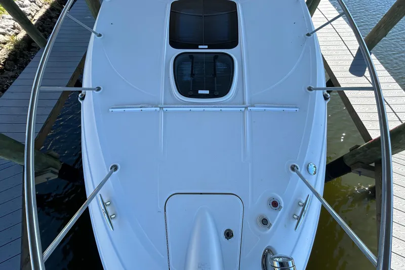 Slide: The Image of Open wooden drawer in 2012 Sea Ray Sundancer 310 boat interior. - 125