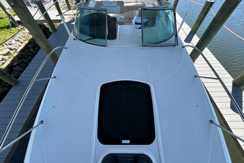Slide: The Image of Electrical panel inside a 2012 Sea Ray Sundancer 310 boat cabin. - 127