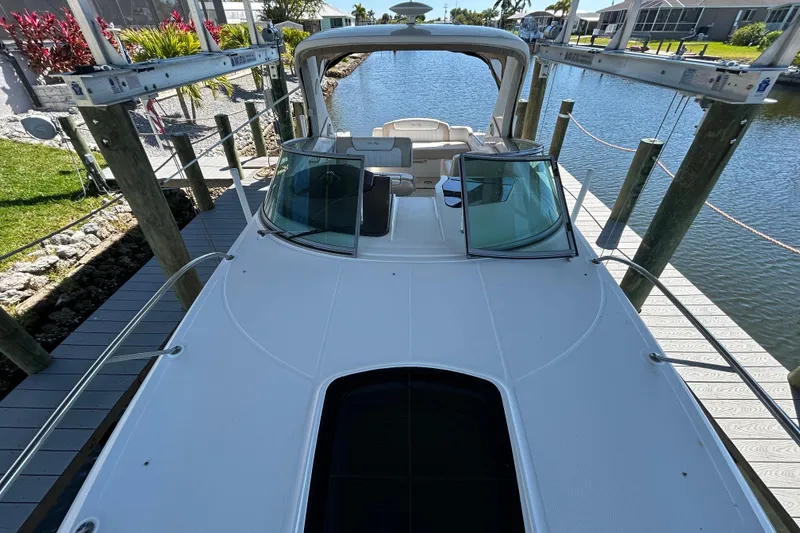 Slide: The Image of Electrical control panel on a 2012 Sea Ray Sundancer 310 boat. - 128