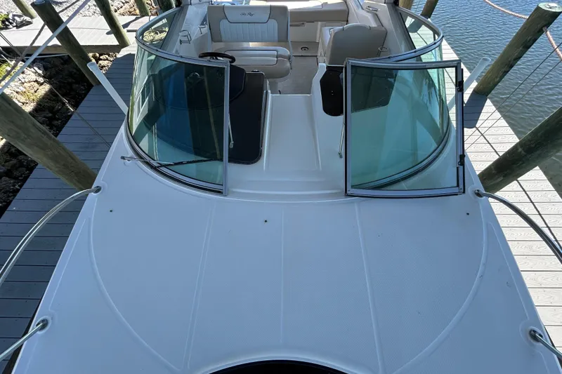Slide: The Image of Wooden cabinet interior of 2012 Sea Ray Sundancer 310 boat. - 129