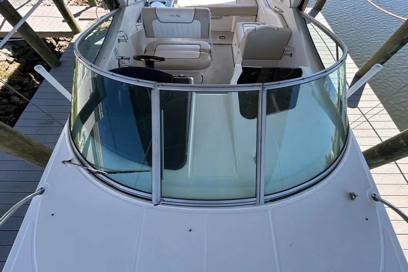 Slide: The Image of Wooden cabinet door inside a 2012 Sea Ray Sundancer 310 boat. - 131