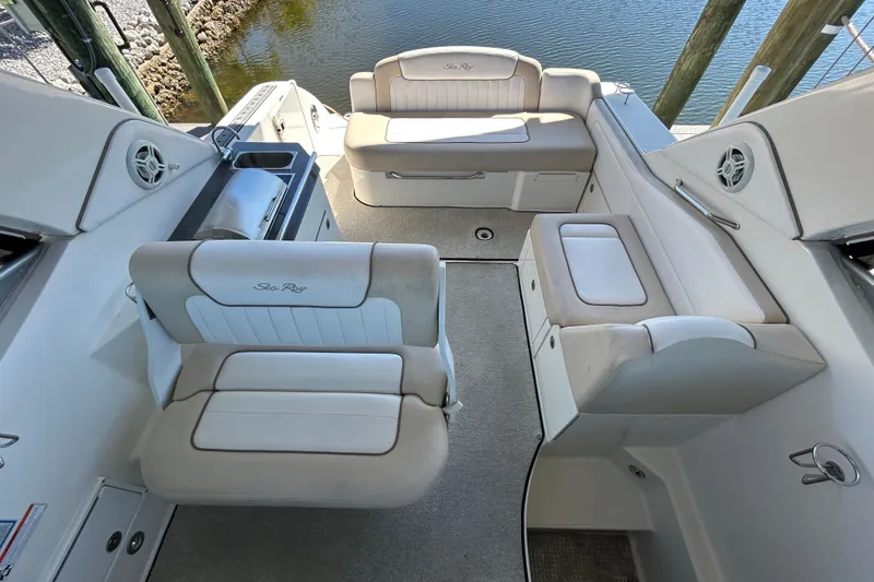 Slide: The Image of Under-seat storage compartment in 2012 Sea Ray Sundancer 310 boat interior. - 137