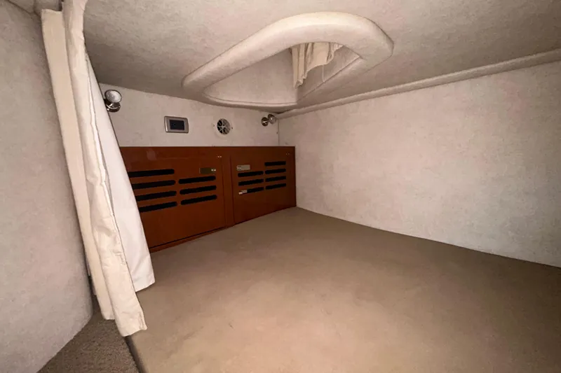 Slide: The Image of Wooden cabinet interior on a 2012 Sea Ray Sundancer 310 boat. - 145