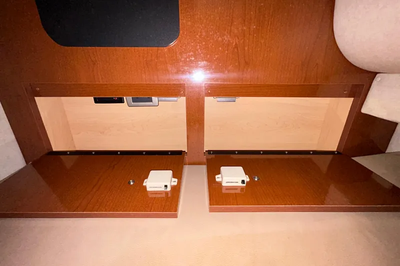 Slide: The Image of Battery compartment of a 2012 Sea Ray Sundancer 310 boat with Duracell battery. - 148