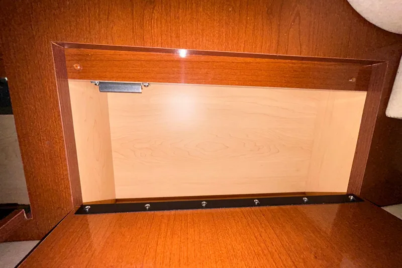 Slide: The Image of Red battery switch on a 2012 Sea Ray Sundancer 310 boat. - 150